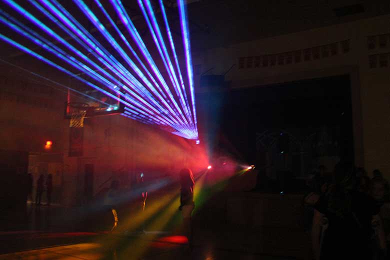 School Laser Light Show, DJ Ancaster, School dance with fan of Blue beams coming from the laser light show. Taken in Ancaster Ontario.